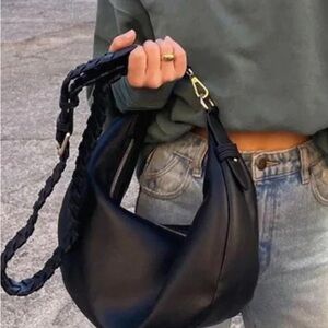 Jules Kae Zola hobo bag in black vegan leather with a braided shoulder strap